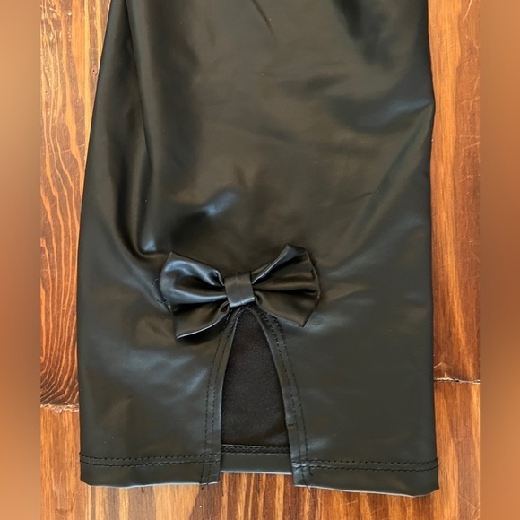TORRID Faux Leather Black Cropped Leggings Bow Accents On Back - Picture 10 of 10